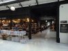 Historic Market Hall Reopens After Lengthy Restoration traders and shoppers in market hall