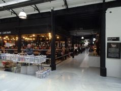 Historic Market Hall Reopens After Lengthy Restoration traders and shoppers in market hall