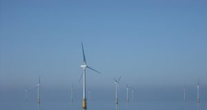 Ports Race to Expand for the Offshore Wind Build-Out Offshore wind turbines at sea