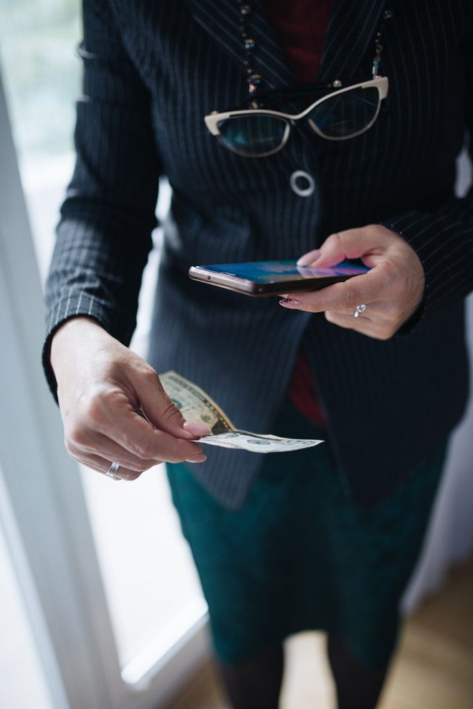 a smartphone showing a crypto wallet app